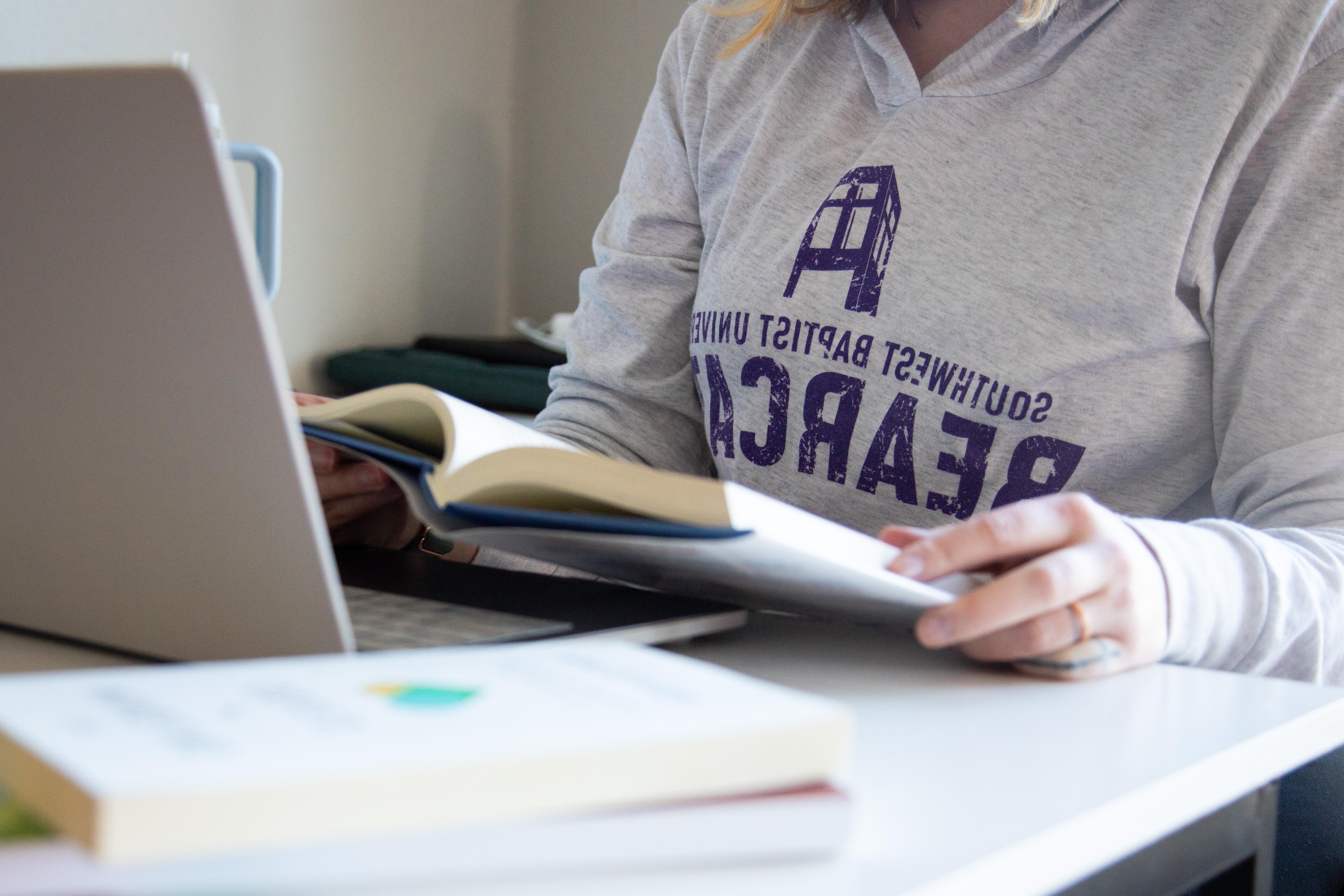 a woman completing her homework